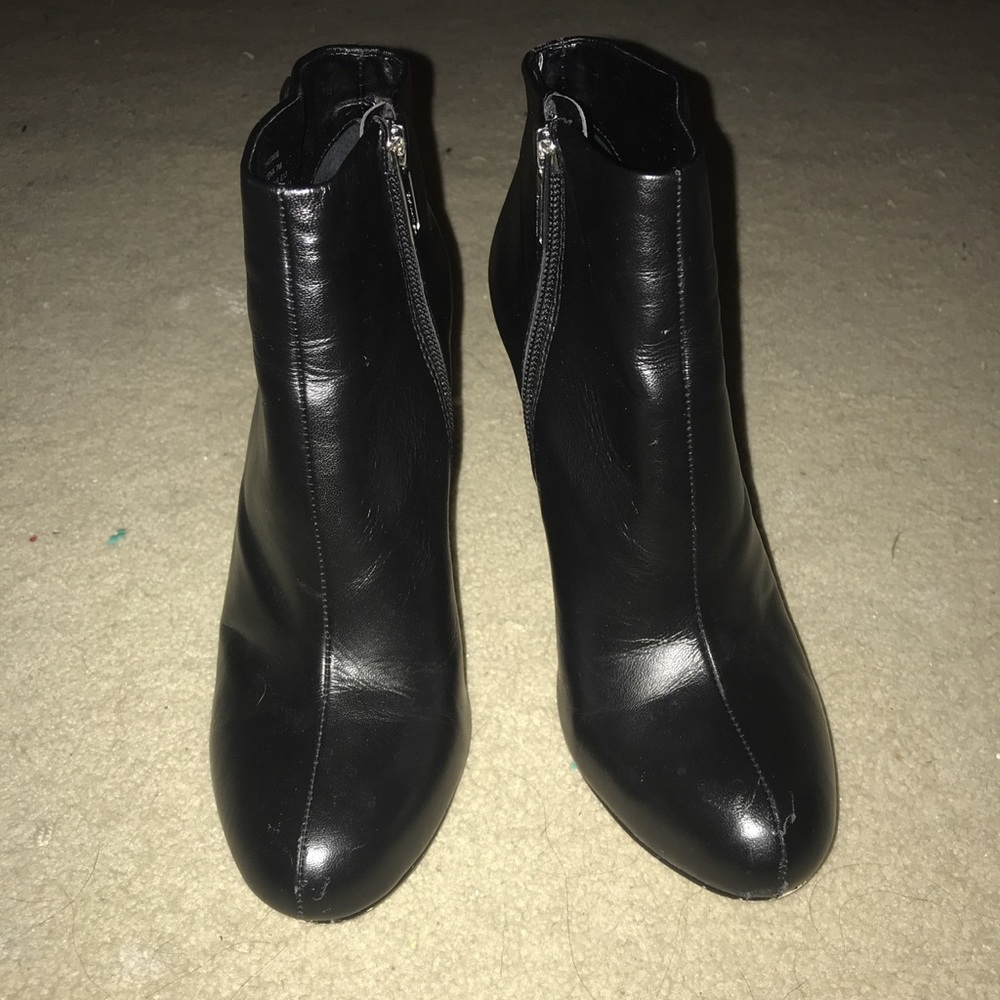 Calvin Klein black booties. Never worn